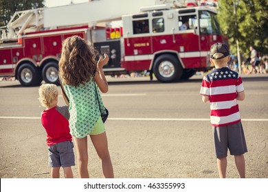 Kids watching an Independence Day Parade