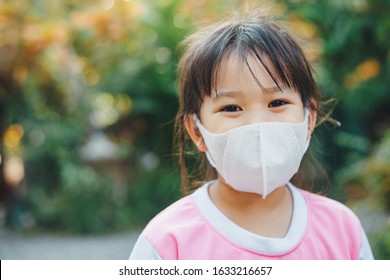 Kids Wearing The Mask For Protect Them Self From Virus And Air Pollution. Prevention By Mask To Reduce Spread Of The Coronavirus (covid-19) Outbreak From Human To Human Transmission.