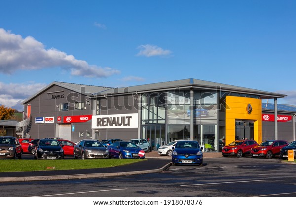 Kidwelly, Wales, UK, November 20, 2016 : Renault\
car showroom dealership showing its company logo and vehicles for\
sale, stock photo\
image
