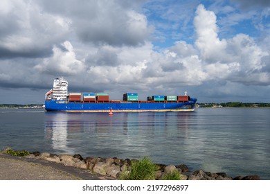 Kiel, Germany, Aug. 2022 Kieler Förde A Container Freighter Passes The Friedrichsorter Enge Near Heikendorf Towards The Baltic Sea