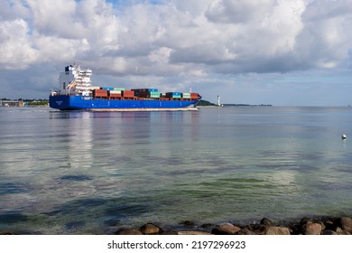 Kiel, Germany, Aug. 2022 Kieler Förde A Container Freighter Passes The Friedrichsorter Enge Near Heikendorf Towards The Baltic Sea