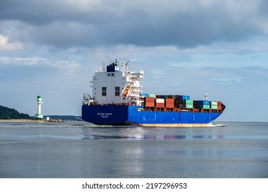 Kiel, Germany, Aug. 2022 Kieler Förde A Container Freighter Passes The Friedrichsorter Enge Near Heikendorf Towards The Baltic Sea