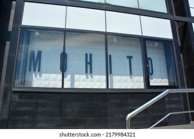 Kielce, Świętokrzyskie, Poland - 2022-07-04 - View Of The Logo Of The Mohito Store - Empty Showcase