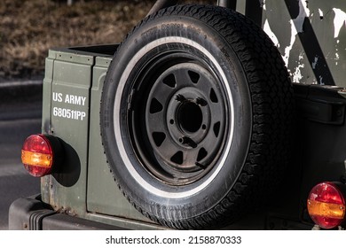 KIELCE, POLAND - Feb 12, 2022: A Closeup Shot Of A Spare Tire At The Back Of A US Military Surplus Jeep Car