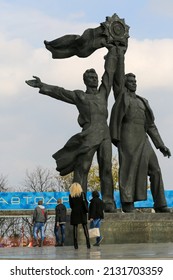 Kiev - October 27, 2013: Bronze Statue Of Russian And Ukrainian Worker Holding Up The Soviet Order Of Friendship Of Peoples.