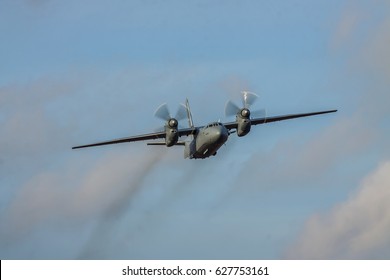 Kiev Region, Ukraine - January 5, 2012: Iraqi Air Force An-32 Cargo Plane In Flight With Blue Sky On Sunset