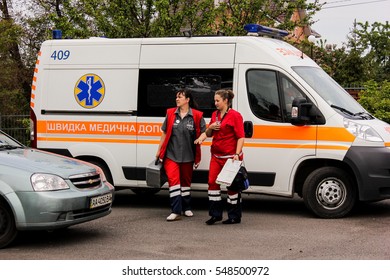 KIEV REGION, UKRAINE - May 12, 2016:  Ambulance And A Nurse  On The Street. Ambulance Is Near The Hospital