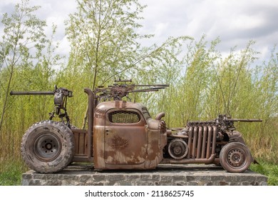 Kiev, Ukraine - 05.15.2021: Victoria Film. Sculpture Car From The Motion Picture Mad Max. Iron Fantastic Transport With Weapon On Board Made From Auto Parts. Art Object Elements From Scrap Metal.