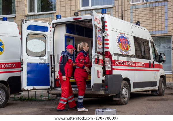 Kiev.\
Ukraine 06.08.2021. Ambulance workers near the\
car.