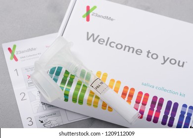 Kiev, Ukraine - 17 October 2018: 23andMe personal genetic test saliva collection kit, with tube, box and instructions. Illustrative editorial.