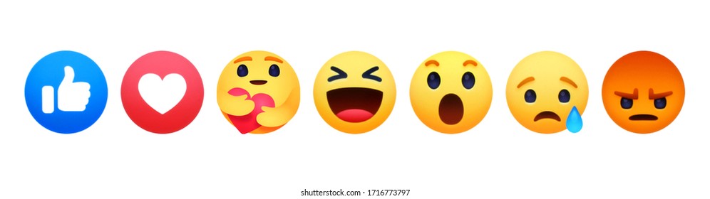 Kiev, Ukraine - April 18, 2020: Facebook like button Empathetic Emoji Reactions with New Care Reaction, printed on paper. Facebook is adding hug reaction to show care during the COVID-19 pandemic