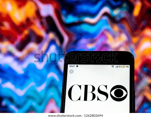 KIEV, UKRAINE - Dec 19,,\
2018:  CBS Television broadcasting company logo seen displayed on\
smart phone