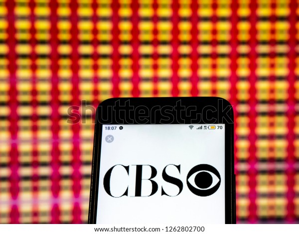 KIEV, UKRAINE - Dec 19,,\
2018:  CBS Television broadcasting company logo seen displayed on\
smart phone
