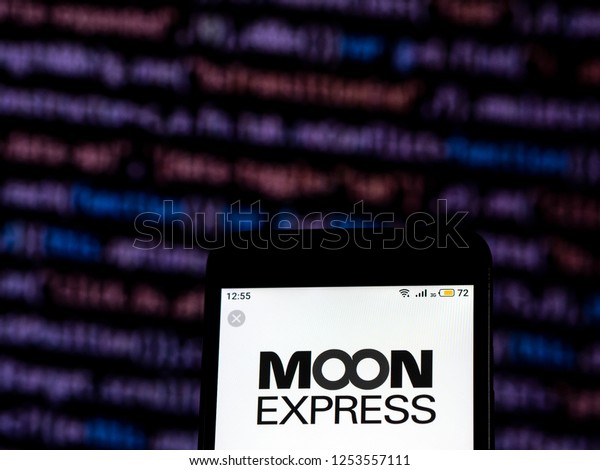 KIEV, UKRAINE - Dec 9, 2018: Moon Express Company\
logo seen displayed on smart phone. Company is eligible to bid on\
NASA delivery services to the lunar surface through Commercial\
Lunar Payload Service