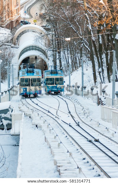 KIEV, UKRAINE - DECEMBER 03, 2016:
Winter Kiev funicular wagon pulls into the bottom
station