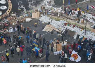 KIEV, UKRAINE - DECEMBER 14: Demonstrators guard EuroMaidan barricades on Institutska street during peaceful protests against Ukrainian president and government on December 14, 2013 in Kiev, Ukraine.