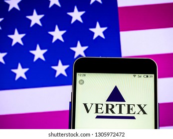 KIEV, UKRAINE - Feb 6, 2019: Vertex Pharmaceuticals Biopharmaceutical Company Logo Seen Displayed On Smart Phone