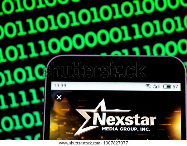 KIEV, UKRAINE\
- Feb 8, 2019:  Nexstar Media Group Television broadcasting company\
 logo seen displayed on smart\
phone