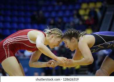 KIEV, UKRAINE - FEBRUARY 16: Match Between Maroulis, USA, Blue And Hanchar, Belarus During XIX International Freestyle Wrestling And Female Wrestling Tournament In Kiev, Ukraine On February 16, 2013