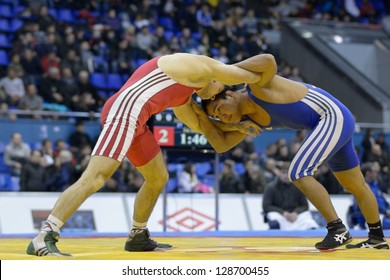 KIEV, UKRAINE - FEBRUARY 16: Match Between Enmengi, Russia, Blue And Sivakov, Belarus During XIX International Freestyle Wrestling And Female Wrestling Tournament In Kiev, Ukraine On February 16, 2013