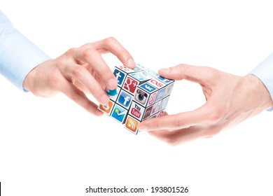 KIEV, UKRAINE - FEBRUARY 2, 2013: Male Hands Holding Rubik's Cube With Logotypes Of Well-known Social Media Brands. Include Facebook, YouTube, Twitter, Google Plus, Instagram, Flickr And Other Logo.