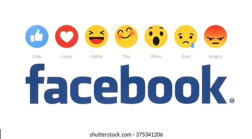 Kiev, Ukraine - February 9, 2016: New Facebook like button 6 Empathetic Emoji Reactions printed on white paper. Facebook is a well-known social networking service.