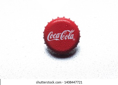 Kiev, UKRAINE - January 12, 2017: classic cap close-up of Coca-Cola on a white background.