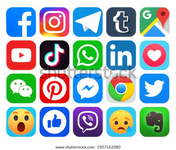 Kiev, Ukraine - January 14, 2021: Set of most\
popular social media logos printed on paper: Facebook, Instagram,\
Twitter and other