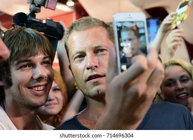 KIEV, UKRAINE: July 03, 2013:  Til Schweiger Takes Selfies With Fans After Movie Premiere