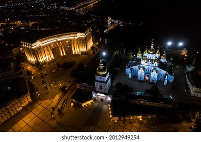 Kiev, Ukraine - July 22, 2021: Night aerial view of the bell tower of St. Michael's Golden-Domed Cathedral, the building of the Ministry of Foreign Affairs is illuminated in the background.
