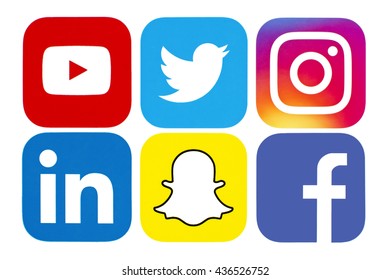 Kiev, Ukraine - June 1, 2016: Collection of popular social media logos printed on paper: Facebook, Twitter, Snapchat, Instagram, LinkedIn and YouTube.