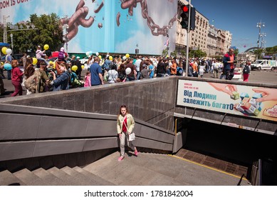 Kiev / Ukraine - June 1, 2019: Woman Going Out Subway Stairs During Anti-abortion Protest In Kiev