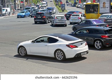 Kiev, Ukraine - June 10, 2017: White Hyundai Genesis Coupe On The Road