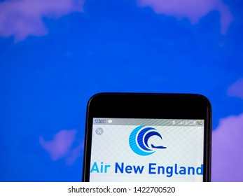 KIEV, UKRAINE - June 11, 2019: In This Photo Illustration The Air New England Logo Is Seen Displayed On A Smartphone