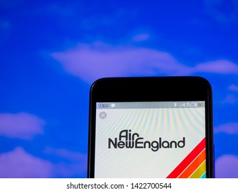 KIEV, UKRAINE - June 11, 2019: In This Photo Illustration The Air New England Logo Is Seen Displayed On A Smartphone