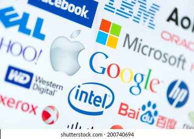 KIEV, UKRAINE - JUNE 12, 2014: A Logotype Collection Of Well-known World Top Companies Of Computer Technologies On A Monitor Screen. Include Google, Apple, Microsoft, Intel And Other Logo.