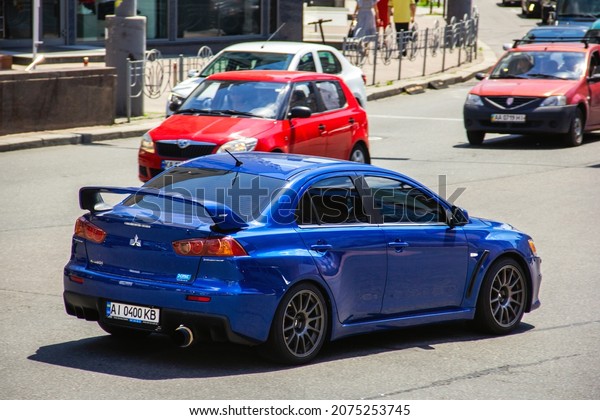 Kiev, Ukraine - June 19, 2021: Blue Mitsubishi\
Lancer Evolution in the\
city