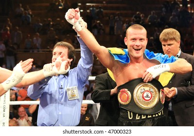 KIEV, UKRAINE - JUNE 19,: Vyacheslav Uzelkov (R) fights with Berlin-based Slovenian Denis Simcic for the WBA Intercontinental light heavyweight champion belt on June 19, 2008 in Kiev, Ukraine