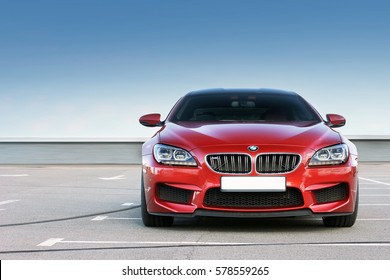 Kiev, Ukraine - June 22, 2014: Red BMW M6 Gran Coupe On A Background Of Clear Sky