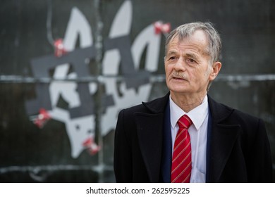 KIEV, UKRAINE - Mar. 21, 2015: Commissioner Of The President Of Ukraine And Lider Of The Crimean Tatars Mustafa Dzhemilev Against Installation Dedicated To  The Annexation Of The Crimea