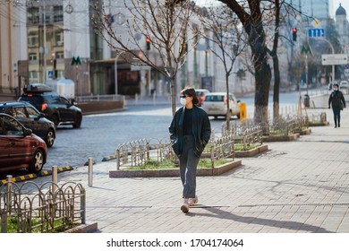 Kiev, Ukraine, March 28, 2020, Ukrainian People At Facial Protective Masks At Almost Empty Street, Quarantine Time At Ukraine,