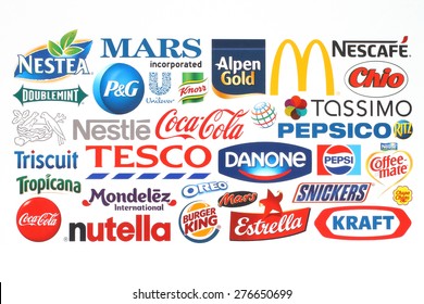 KIEV, UKRAINE - MAY 07, 2015:Collection of popular food companies and brand logos printed on paper:Coca-Cola, Mars Incorporated, Kraft, Pepsi, Nestle, Pepsi and others.