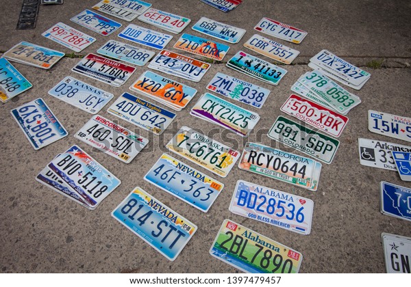 KIEV, UKRAINE - MAY 10,\
2019: Old American license plates.\
Annual show and festival of old\
and retro cars in the National Aviation Museum. Vintage American\
license plates.