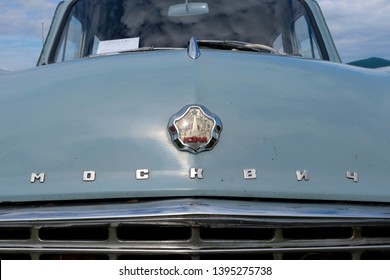 KIEV, UKRAINE - May 12, 2019: A Close Up Of A Vintage Soviet Moskvich Logo On An Executive Class Retro Car At The OldCarLand Classic Auto Show In Kiev, Ukraine.