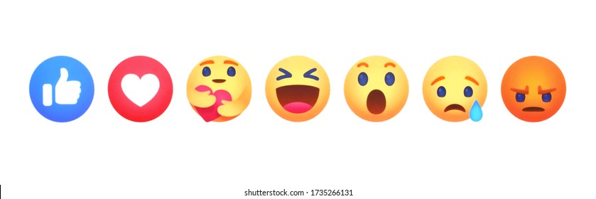 Kiev, Ukraine - May 19, 2020: Facebook like Empathetic Emoji Reactions with New Care Reaction, printed on paper. 