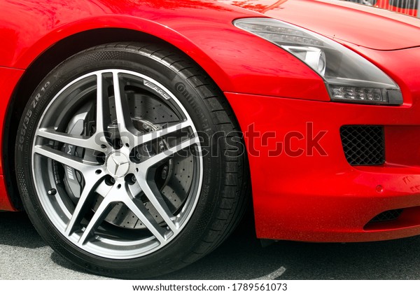 Kiev,\
Ukraine - May 19, 2020: Mercedes-Benz SLS AMG supercar close up.\
Car wheel. Continental tires. Parked car.\
wallpaper
