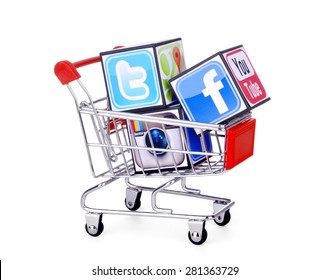   KIEV, UKRAINE - MAY 25, 2015: Cubes With Logotypes Of Social Media: Facebook, Twitter, Instagram, Placed Into Shopping Cart .