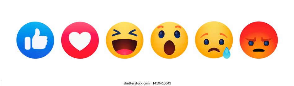 Kiev, Ukraine - May 29, 2019: New Facebook like button 6 Empathetic Emoji reactions printed on paper.Facebook is a known social networking service.