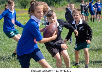 Kiev, Ukraine - May 9, 2018: Children play rugby in retro form at the festival of historical reconstruction