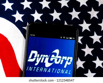 KIEV, UKRAINE - Oct 24, 2018: DynCorp Company Logo Seen Displayed On Smart Phone. 